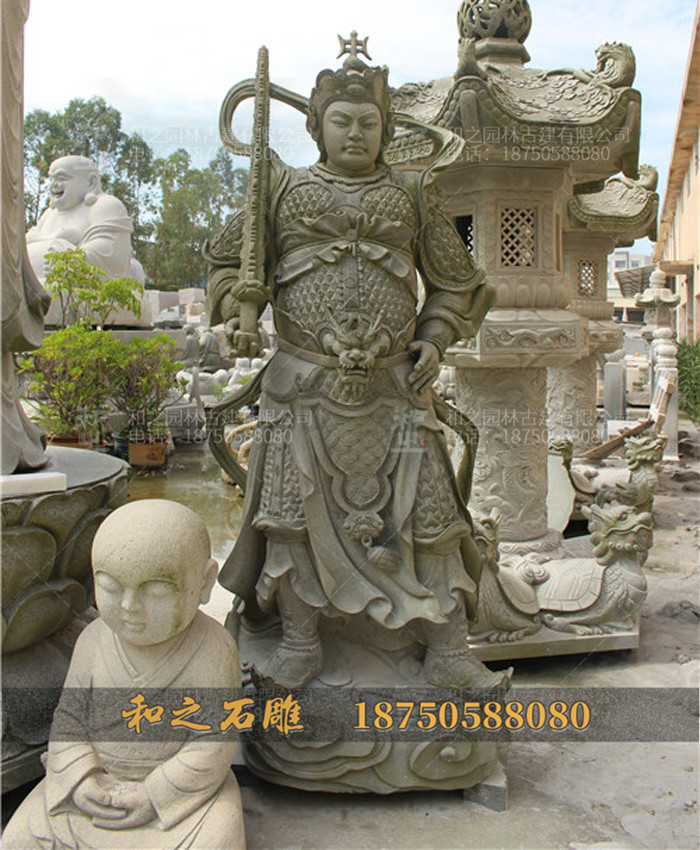 石雕韋陀降魔杵扛肩上